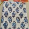 White fabric with purple lavender floral design