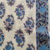 Cream fabric with tree-shaped floral motif and border