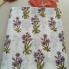 White fabric with pink floral block print design
