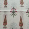 White fabric with purple floral bunch block print