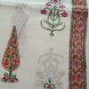 Kota Doria fabric with green leaves and pink flowers