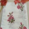 White fabric with hand-block printed pink floral vines