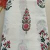 White fabric with multicolor flower bunch patterns