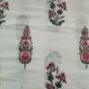 Kota Doria fabric with pink floral vines and green stems