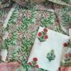 Green white cotton fabric with floral designs