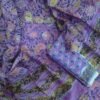 Cotton fabric with intricate green motifs